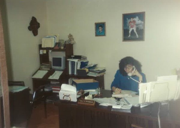 Woman on the phone at her desk
