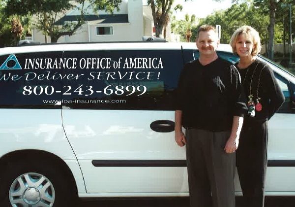 Employees with van with logo