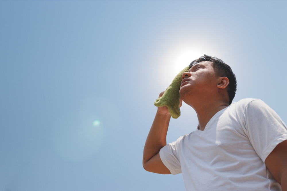 Young,Man,And,Heat,Stroke.
